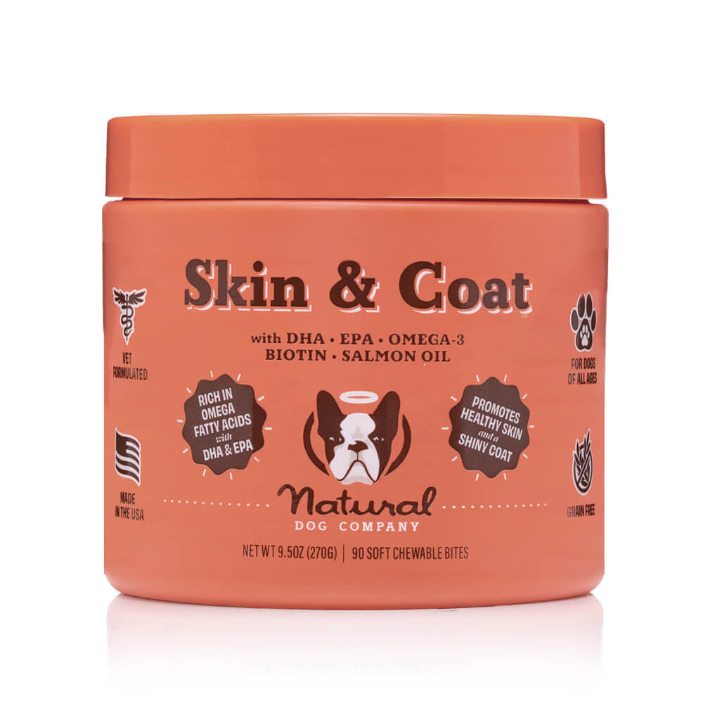 A container of Natural Dog Company Skin & Coat supplements for dogs.
