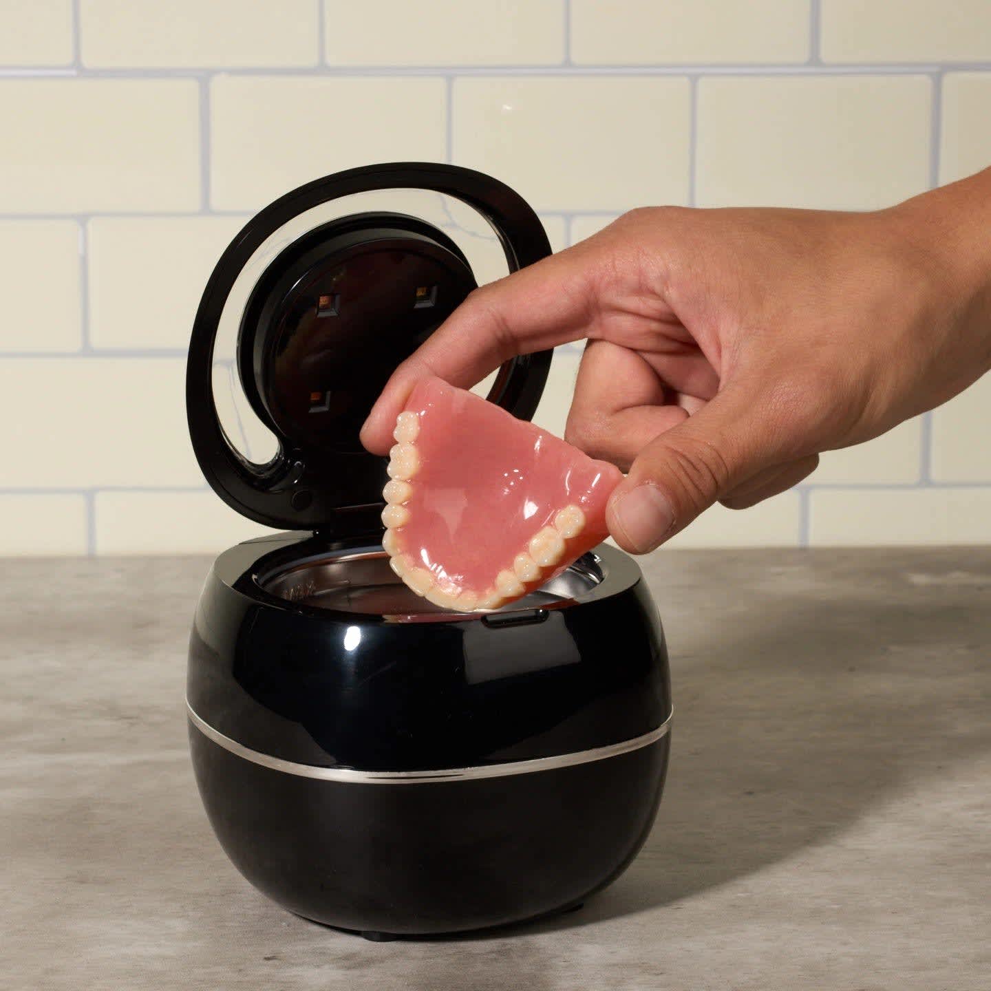 Step 4: Retrieve clean dentures