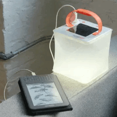 a LuminAID charging multiple devices