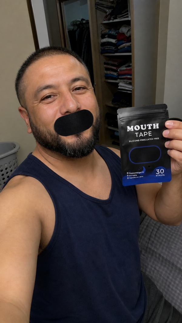 Dan, age 43, wearing a black mouth strip