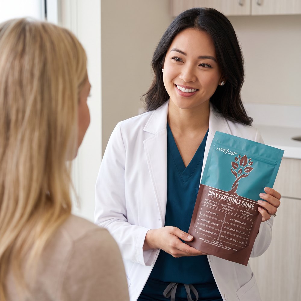 A clinician showing the LyfeFuel Daily Essentials Shake to a patient